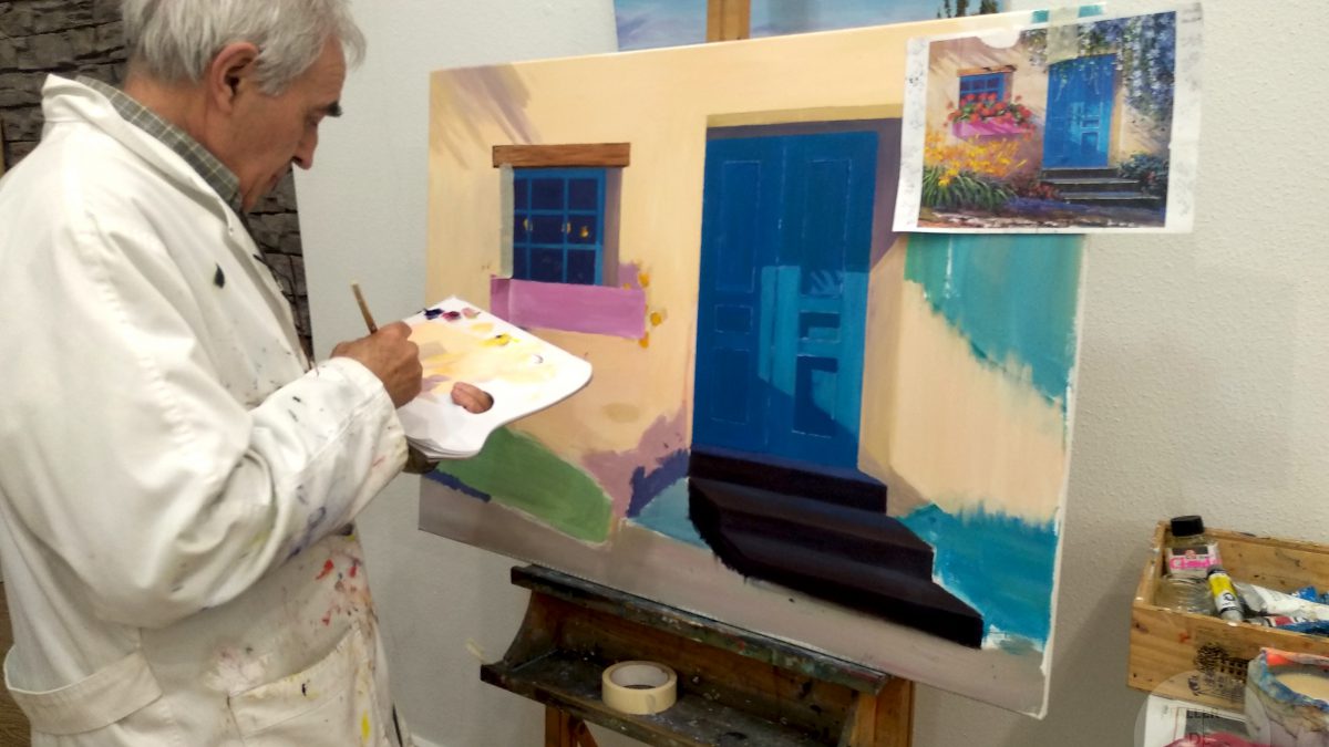 Alumno pintando un óleo