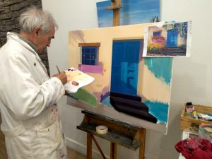 Alumno pintando un óleo