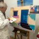 Alumno pintando un óleo
